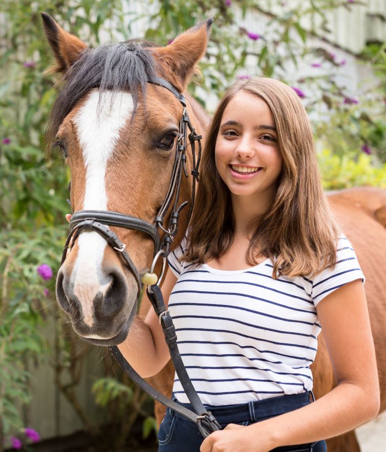 Teenager with her Horse