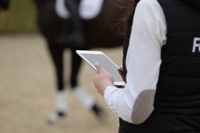 Feedmark Nutritionist holding ipad